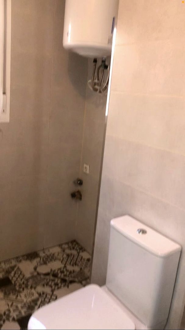 Baño antes, durante la obra